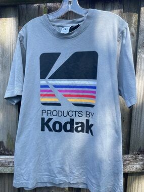 Zara Kodak Gray Tee with Multicolor Stripe Logo.  tag says it’s 42.